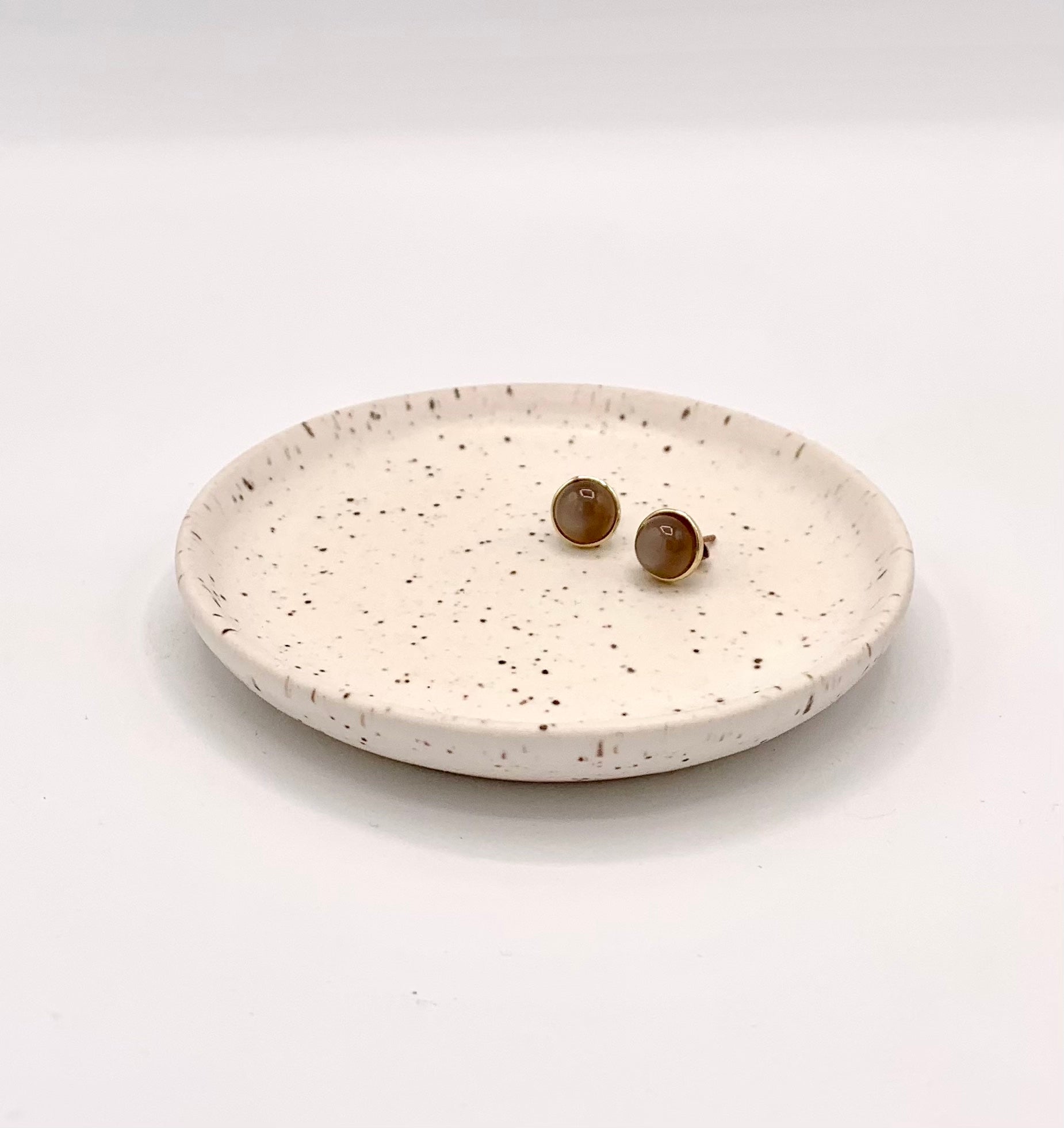 small white speckle ceramic jewelry/trinket dish - perfect of soring your rings, earrings, bracelets and more. 3.5" in diameter